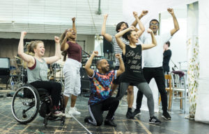 Members of the Tommy cast enjoying rehearsals.